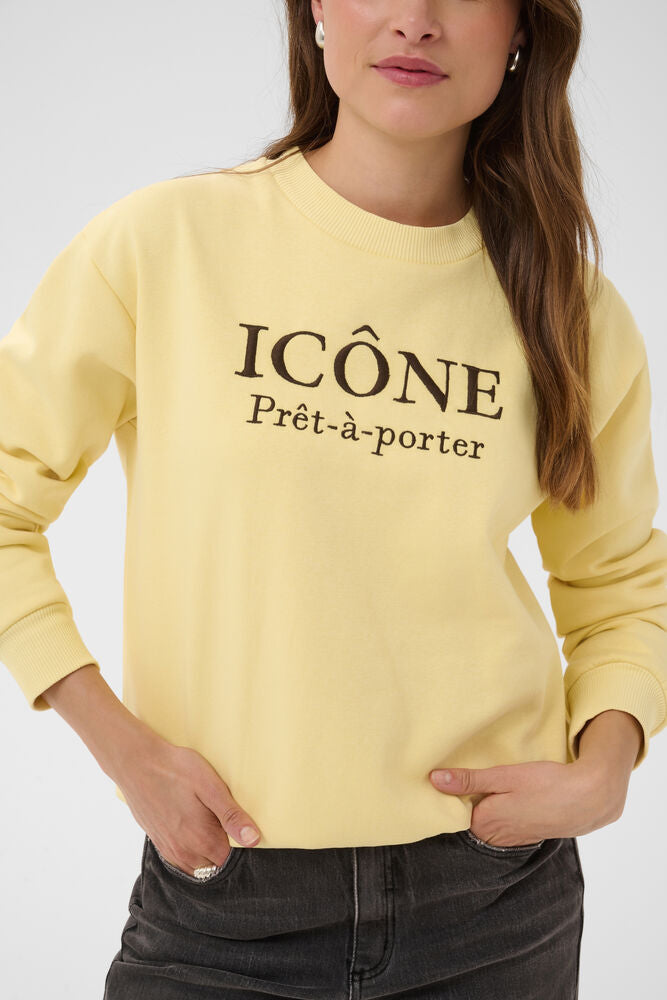 Kaffe sweater geel met bruine tekst model KAroseanne sweat Sunlight