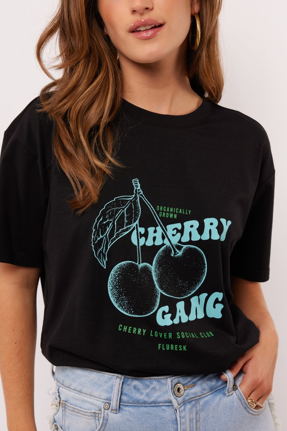 Fluresk T-shirt zwart met blauw groene opdruk model Miralda black